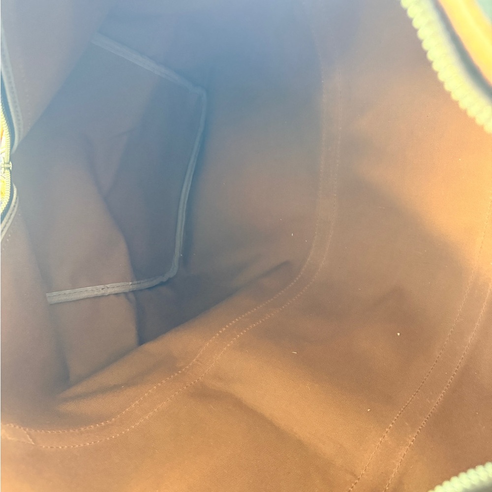 Louis Vuitton Monogram Duffel Bag in Brown and Tan - Picture 8 of 8